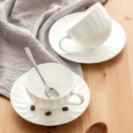 white ceramic coffee cup